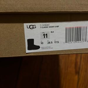Brand new. Unworn Pair of black waterproof Classic II UGGs toddler size 11.